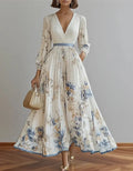 Graceful Cream Chiffon Gown with Watercolor Floral Print and Pleated Skirt